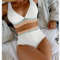 Women's solid pink high waist nylon bikini set shown front and back.