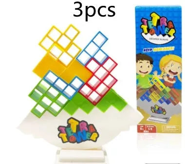 Plastic balance stacking board game with colourful blocks, chassis, and base on table