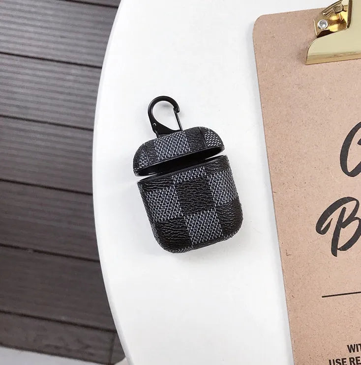 iPhone XS MAX plastic hard shell case with lattice design and an anti-lost hook for a Bluetooth headset.