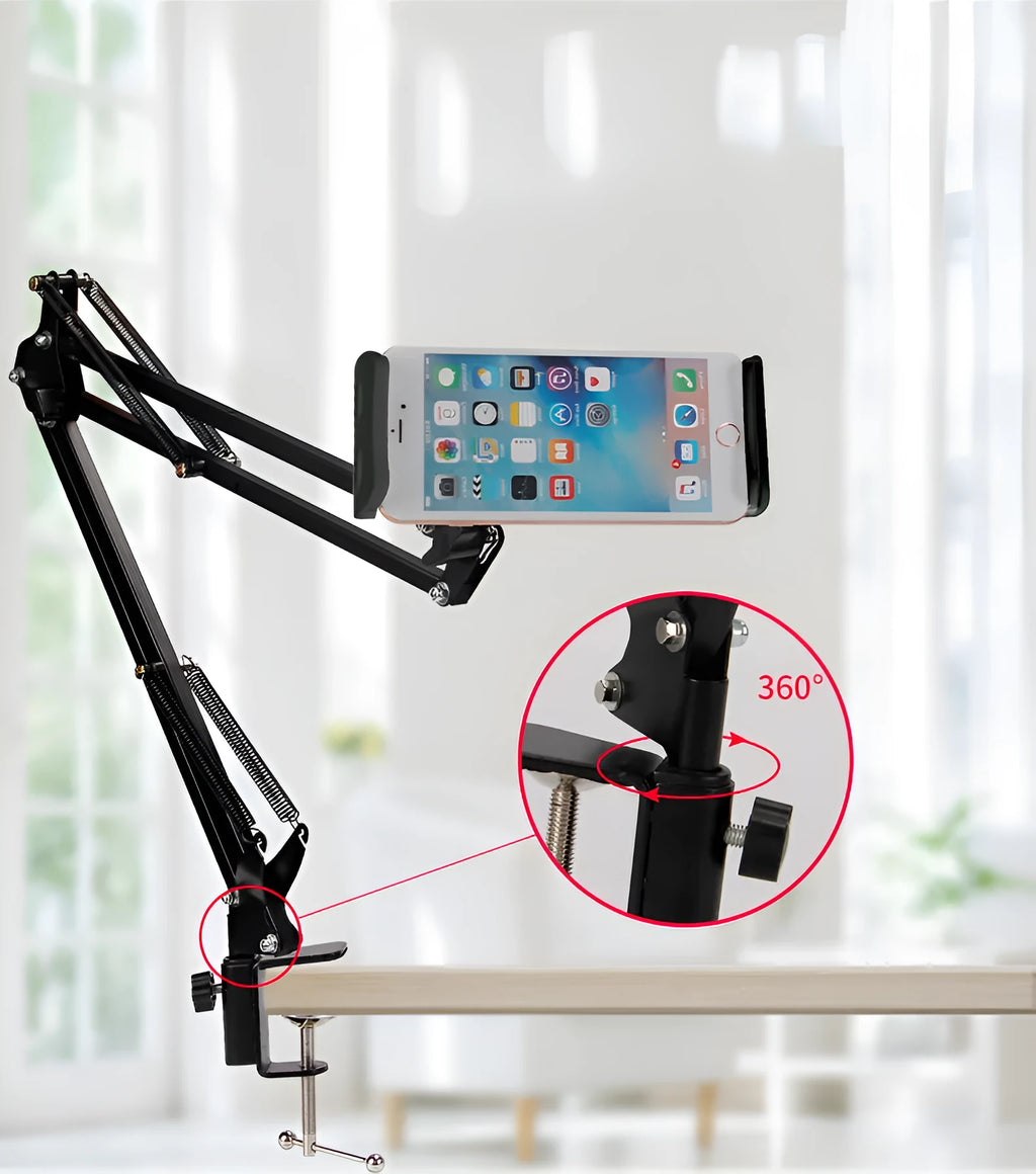 Black adjustable phone tablet stand with 360-degree rotating head on wooden desk