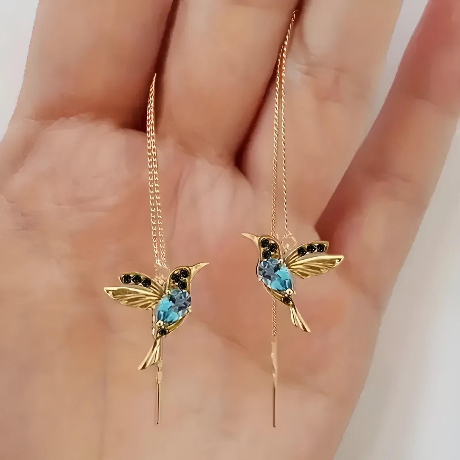 Long style bird hanging earrings with mixed zirconium wings in alloy electroplated construction