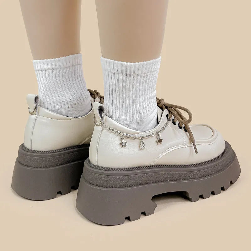 White women's Mary Jane platform shoes with round toe, lace-up front, and thick 6-8cm heel
