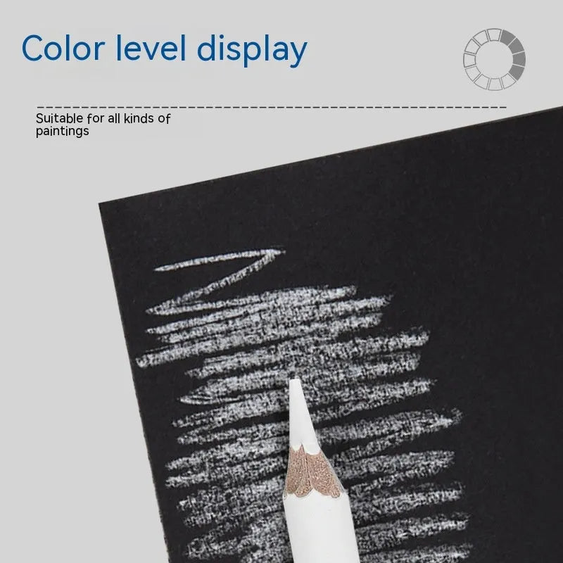 Set of three white charcoal sketching pencils with wooden barrels for highlighting on dark paper