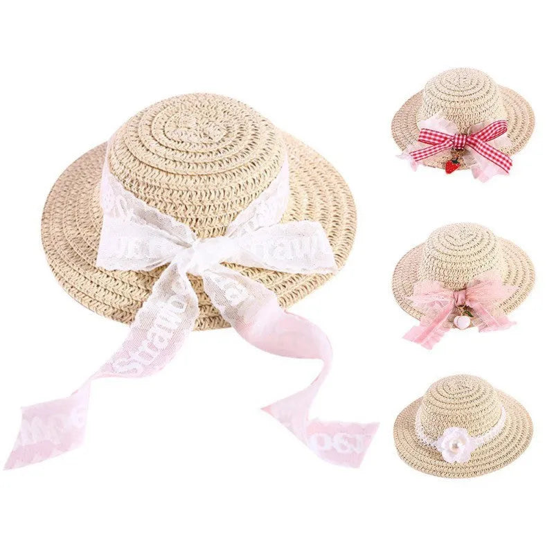 A colourful, handmade paper hat with a bowknot for a dog or cat on a white background.
