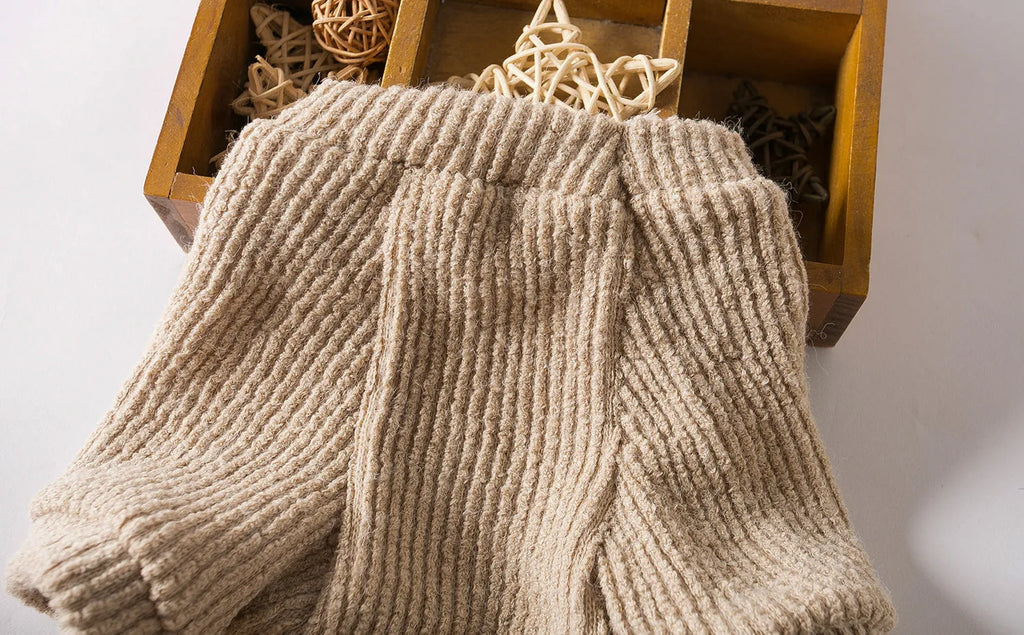 Brown cloth dog sweater pullover for small breeds on a white background.