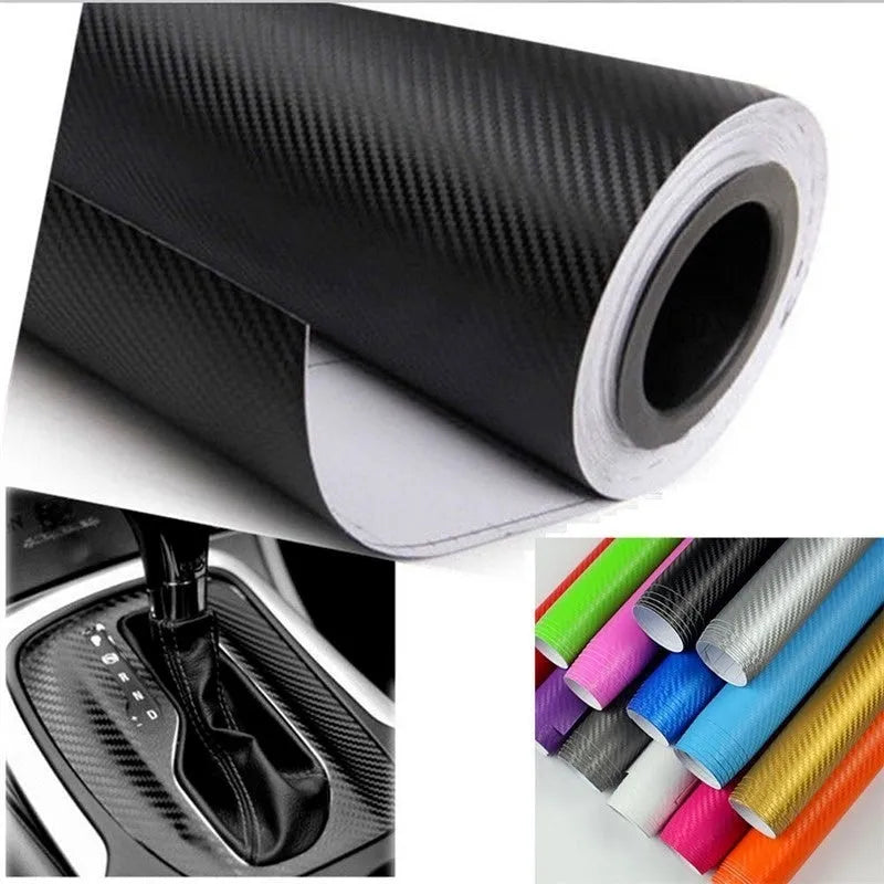 Roll of 3D carbon fibre car sticker showing black, silver, blue, and yellow colour options
