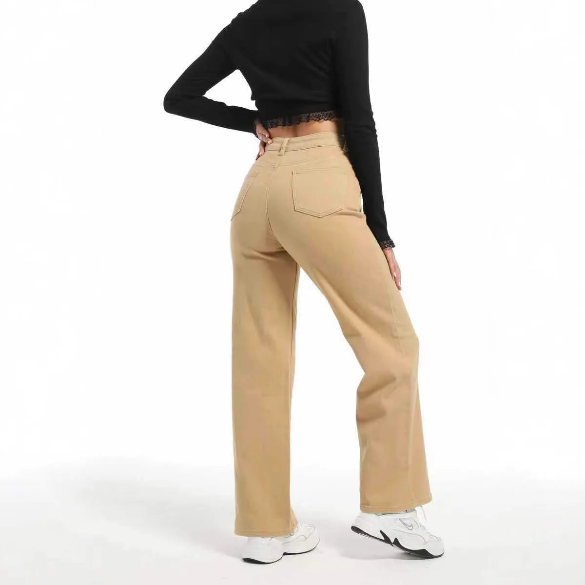 Women's apricot wide leg high waist jeans with straight cut on a hanger