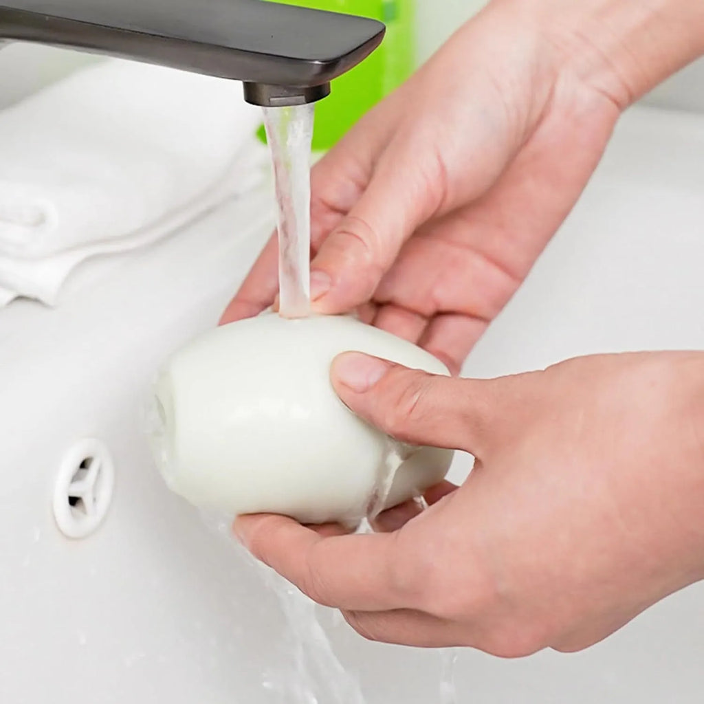 Washable reusable gel lint roller ball for removing pet hair from clothes and furniture