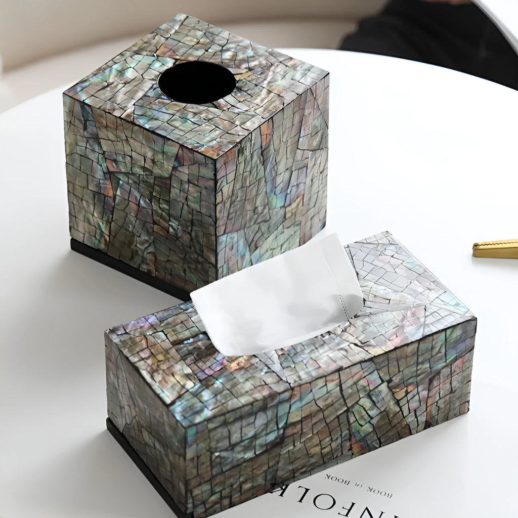 Black square and rectangular natural shell tissue boxes with removable storage organisers.