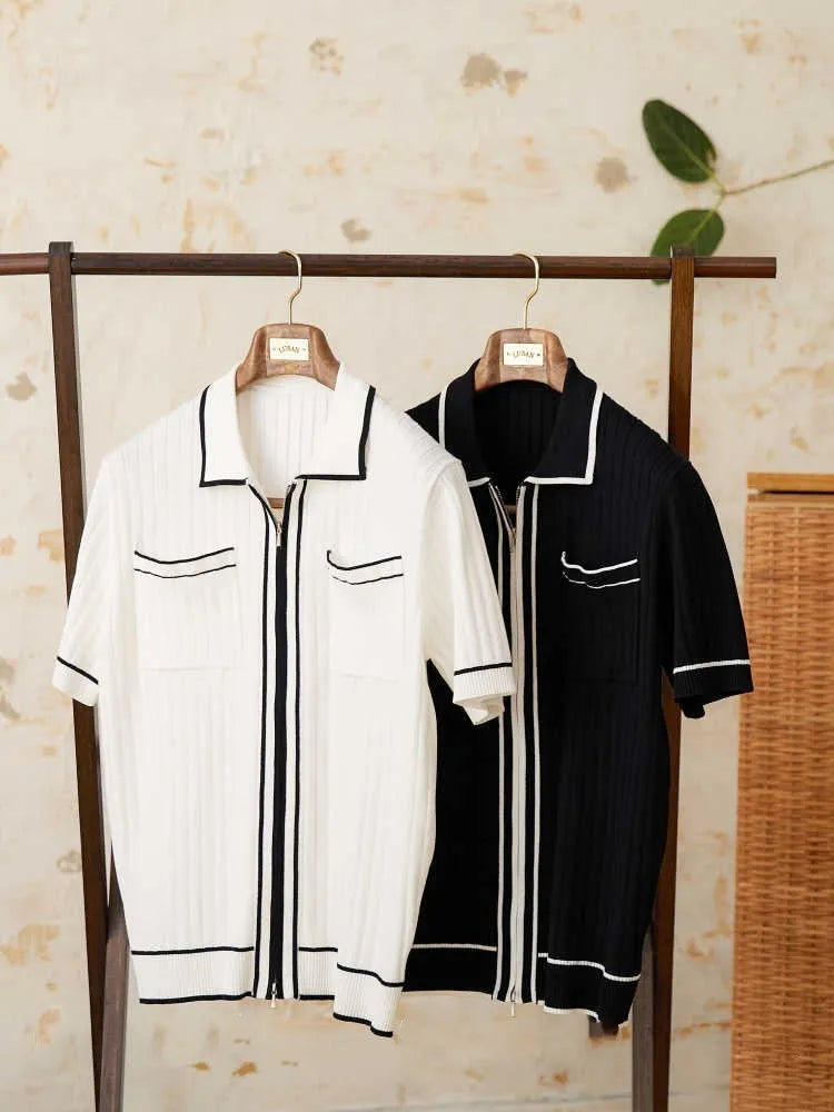 Slim black and white lapel polo shirt with short sleeves on a hanger