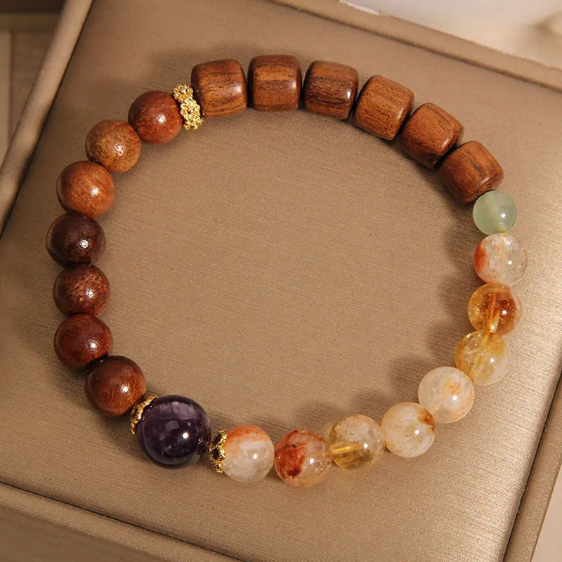 Women's bracelet with yellow tower crystal, ebony amethyst beads, pearl and rhinestone accents