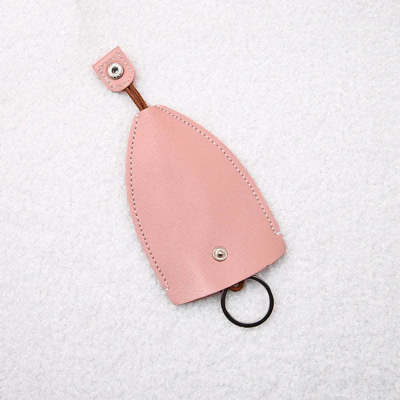 Cartoon PU leather pull-out car key case measuring 14 x 7.5cm with colourful designs