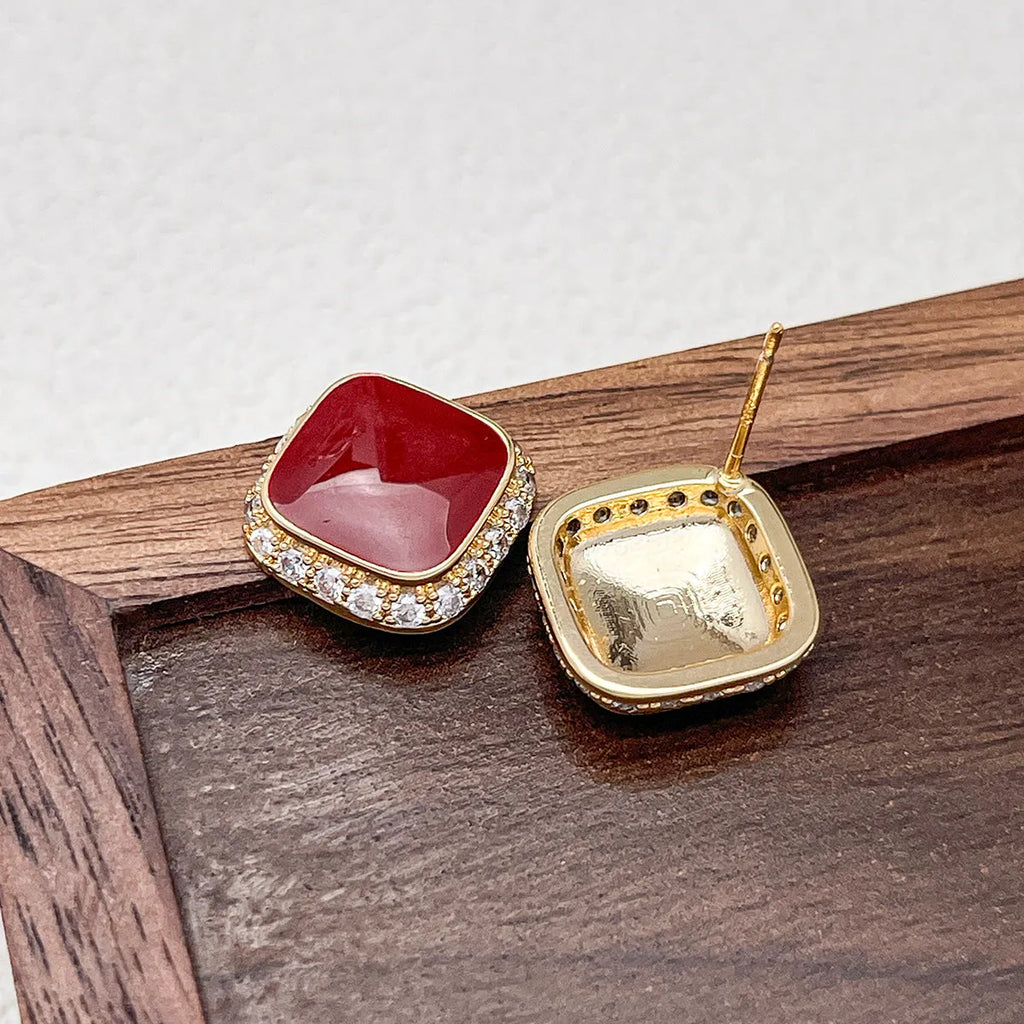 Red square geometric alloy earrings with retro design and stud backing