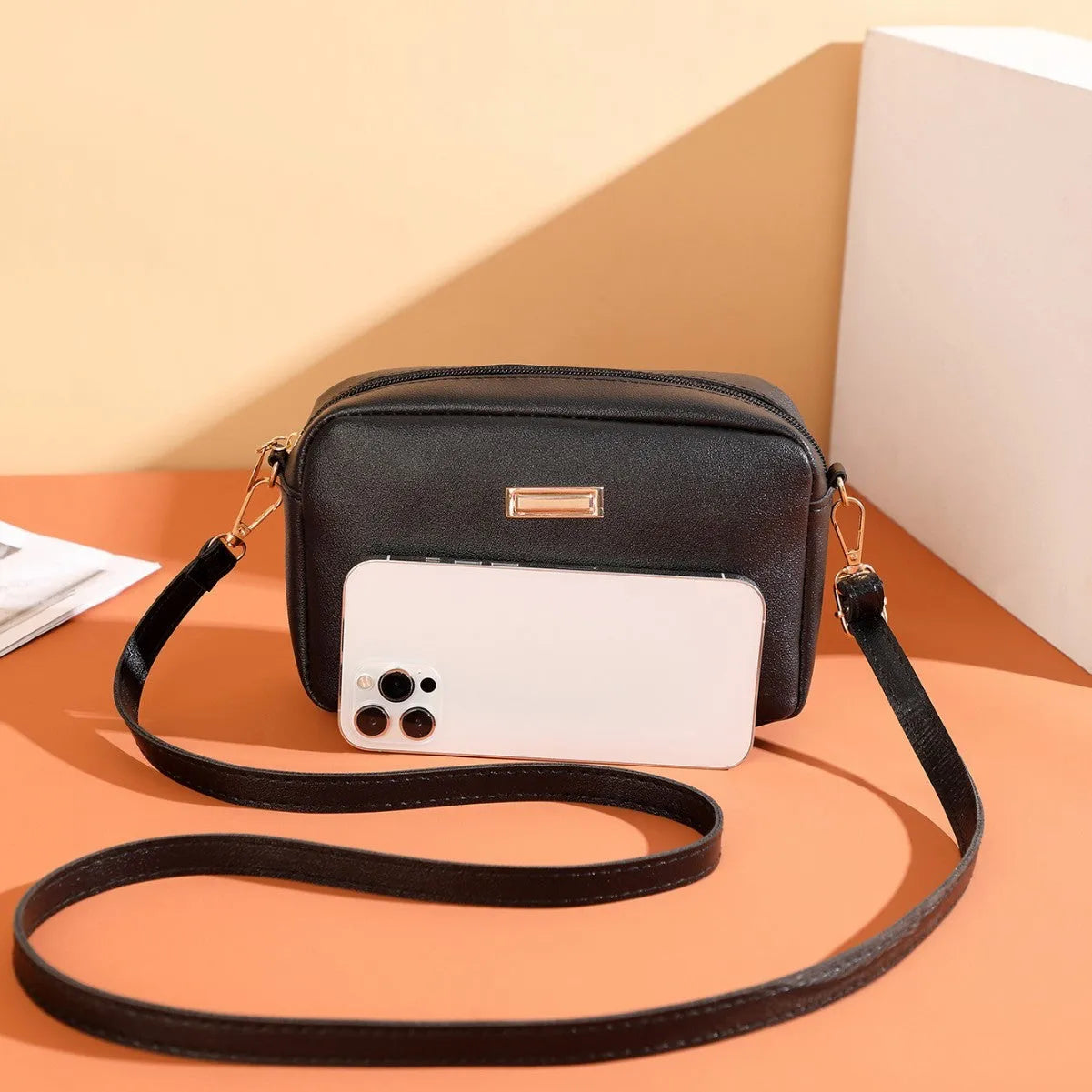 Women's solid colour PU shoulder bag with three-dimensional pocket in urban simplicity design
