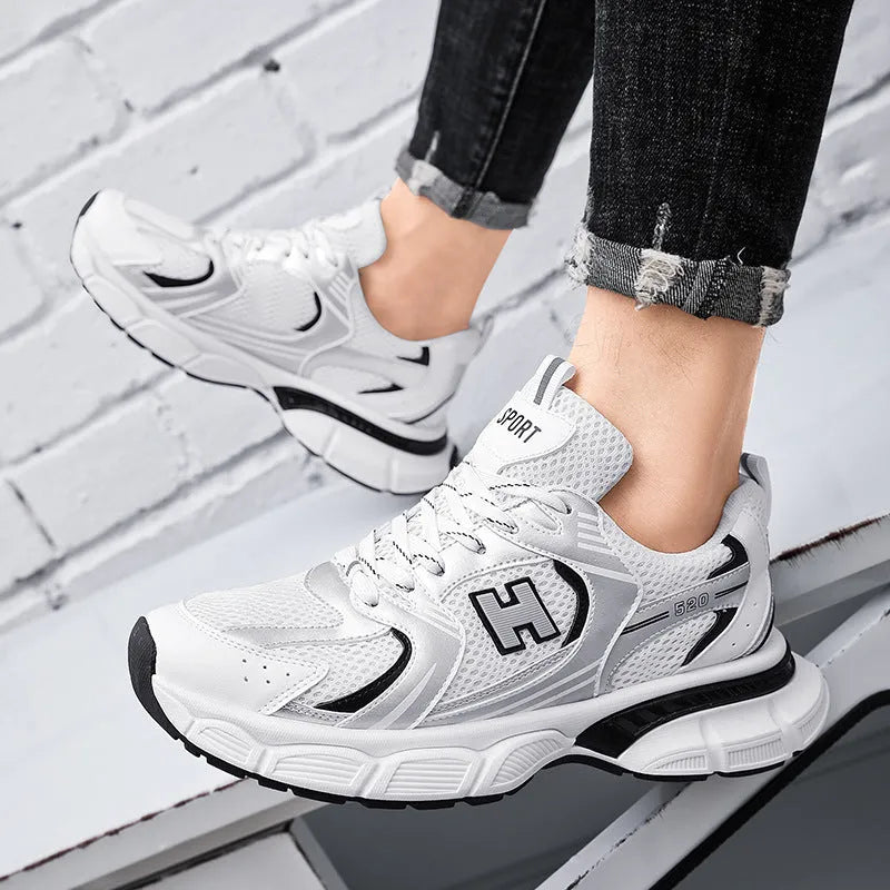 Men's mesh casual running shoes in black, white orange, and white grey with round toe and plastic soles