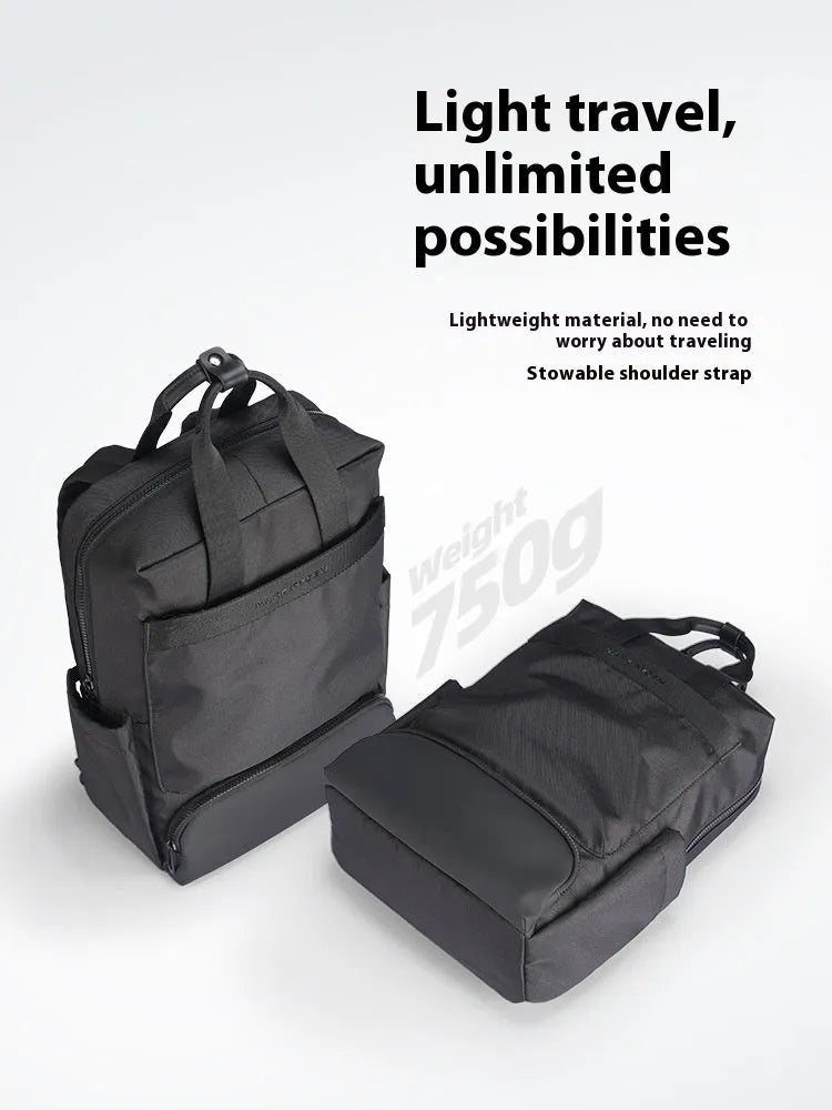 Black oxford cloth computer backpack with multiple compartments showing 20-35 litre capacity