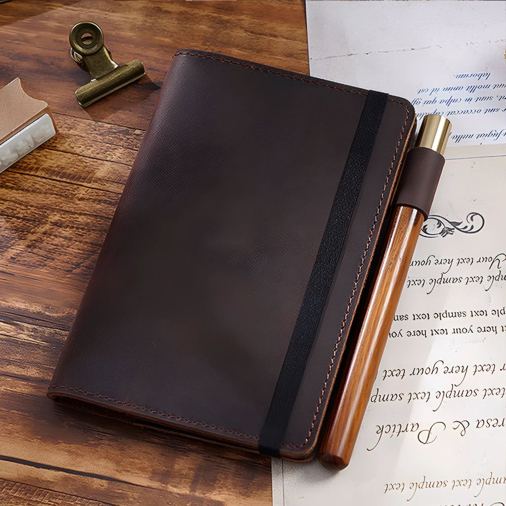 Handmade cowhide kraft notebook open showing wood-free paper with dark green cover option