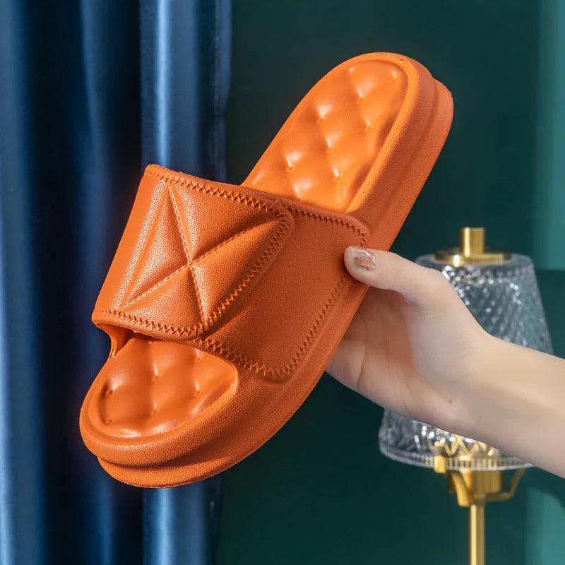 Pair of soft EVA bathroom sandals with a textured non-slip sole, shown in a choice of colours.