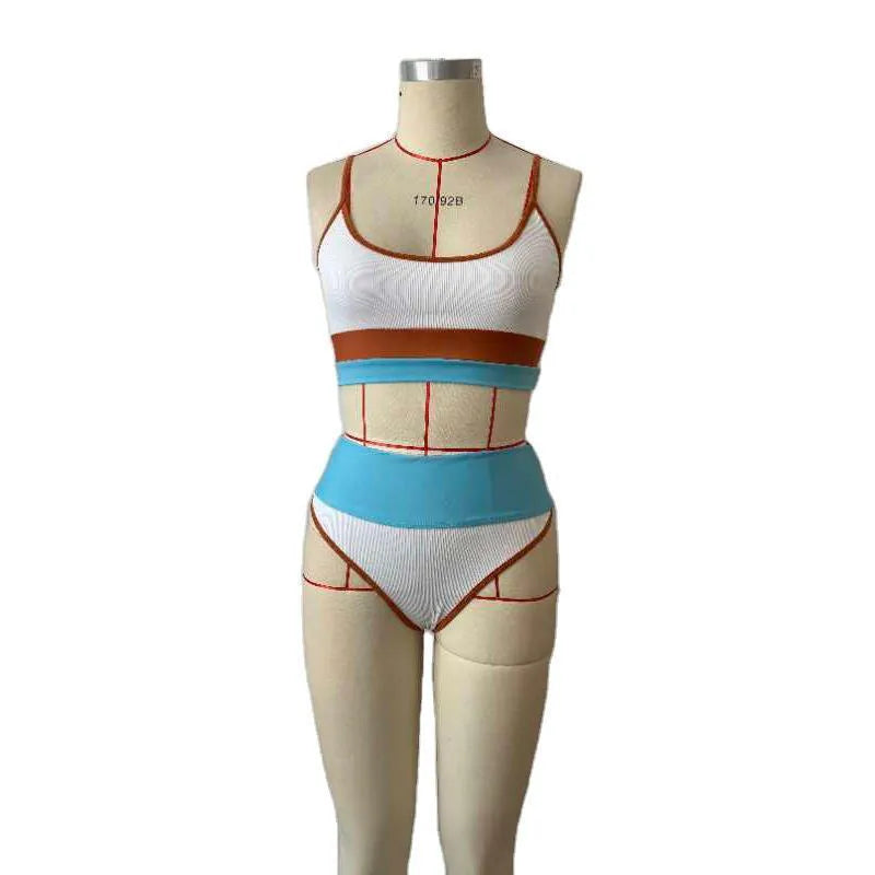 Women's solid colour quick-drying swimsuit set consisting of a top and shorts.