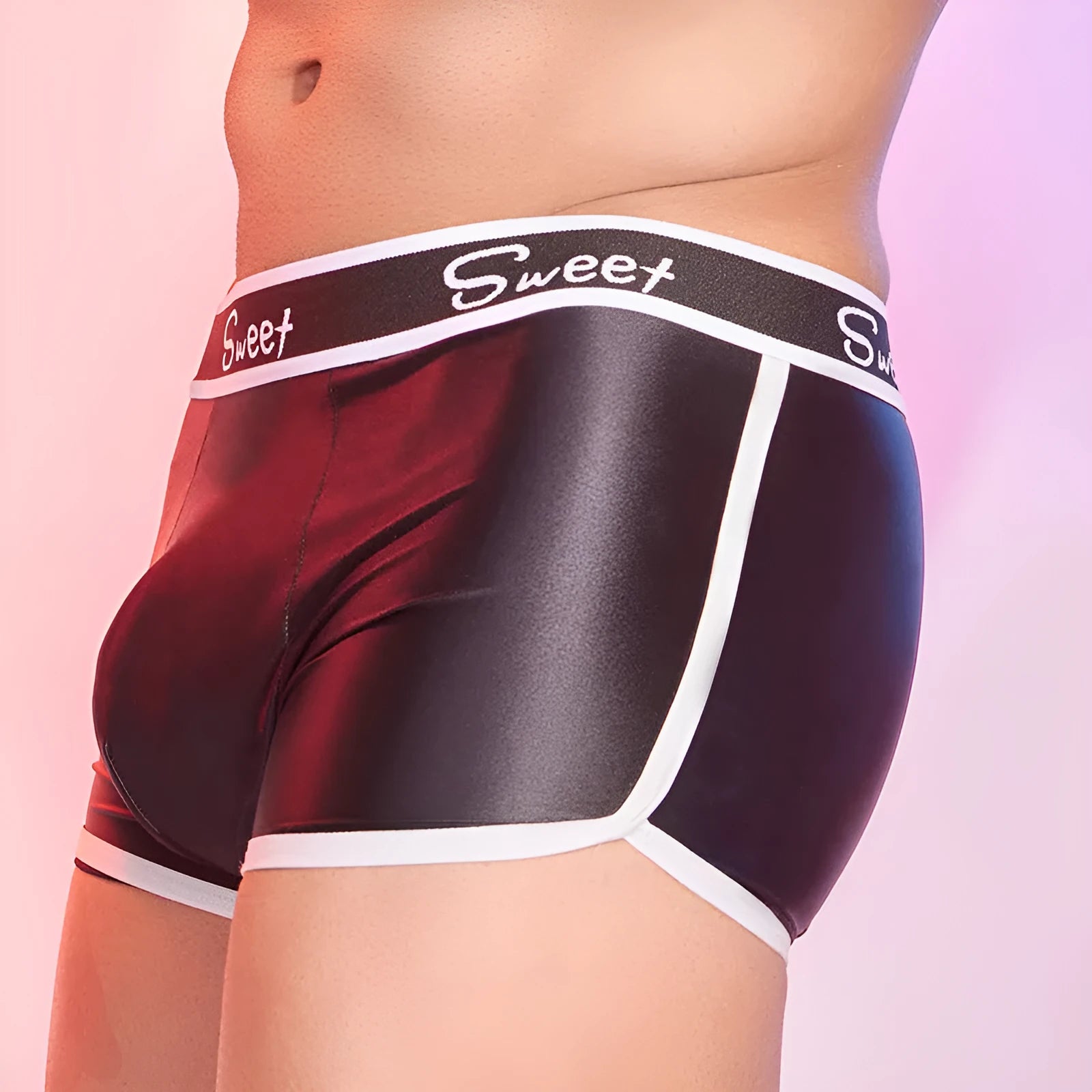 Men's silky nylon boxers in black, white, and sapphire blue colours on a white background.