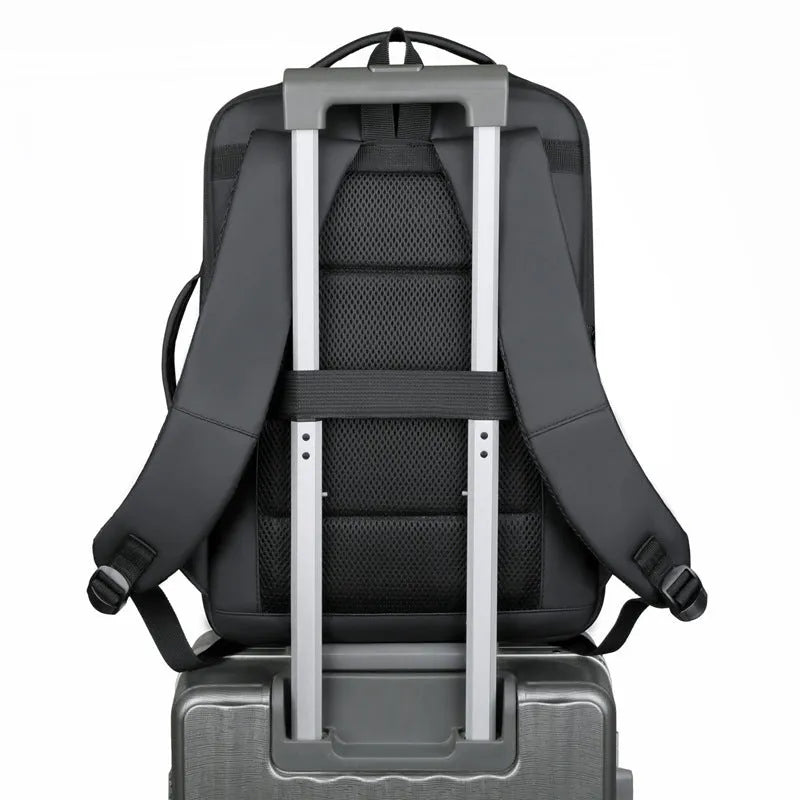 Black Oxford cloth business backpack with shoulder straps showing 20-35L capacity