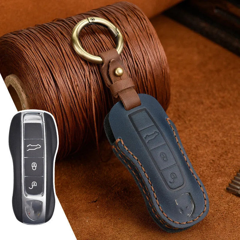 Genuine leather Porsche key case with retro bag buckle in blue and brown colour options