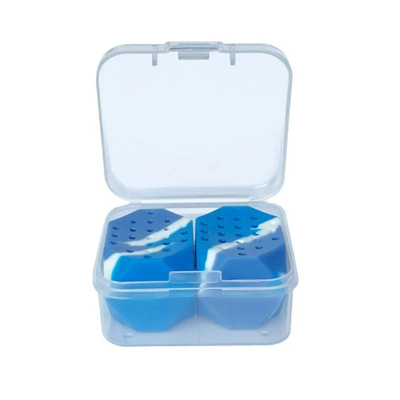 Two camouflage-pattern silicone facial muscle fitness balls for jawline training in a transparent box.