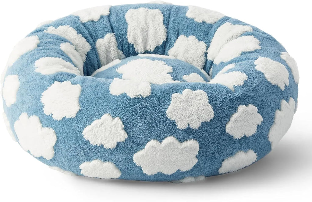 Round plaid dog bed with a plastic base in sea blue and white colour.