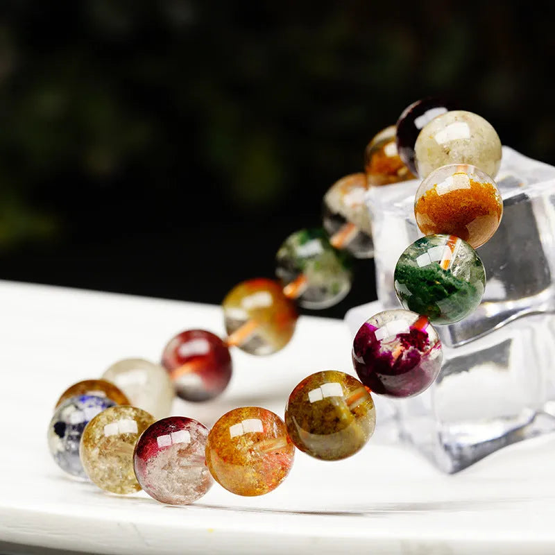 Crystal ethnic style bracelet with 10mm beads showing natural four seasons colourful ghost cornucopia design