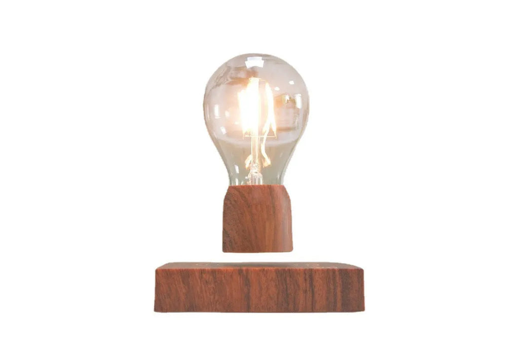 Magnetic levitation floating bulb lamp with glass bulb and imitation wood base