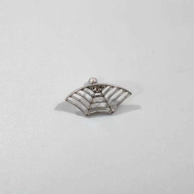 Geometric spider web design stud earrings in gold and silver electroplated metal.