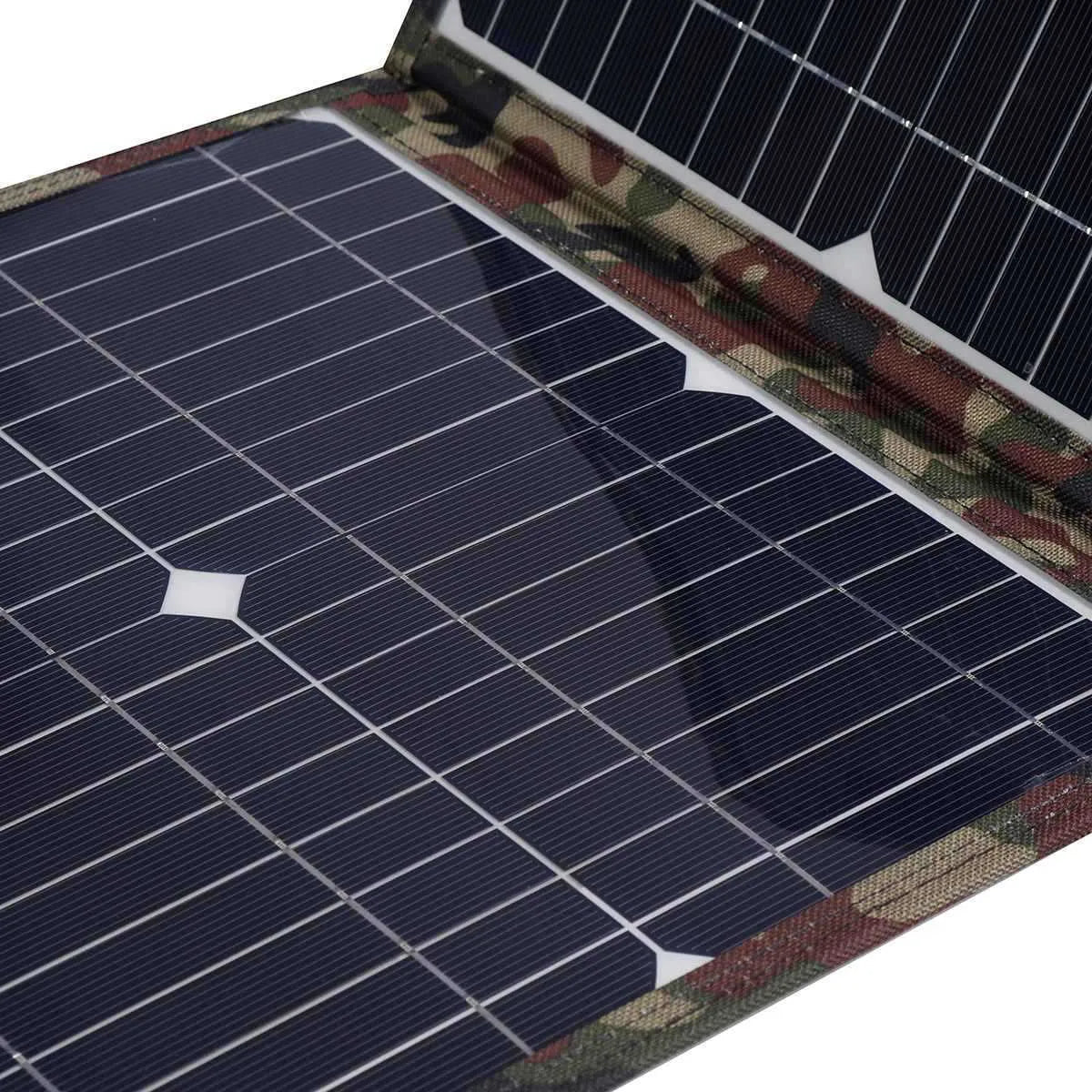 Black foldable 36W portable solar panel unfolded, showing its solar cells and included car charger and USB accessories.