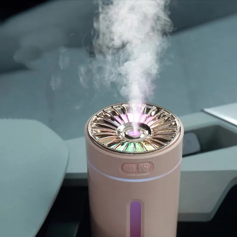 Black portable humidifier with LED lights showing dimensions and USB charging port