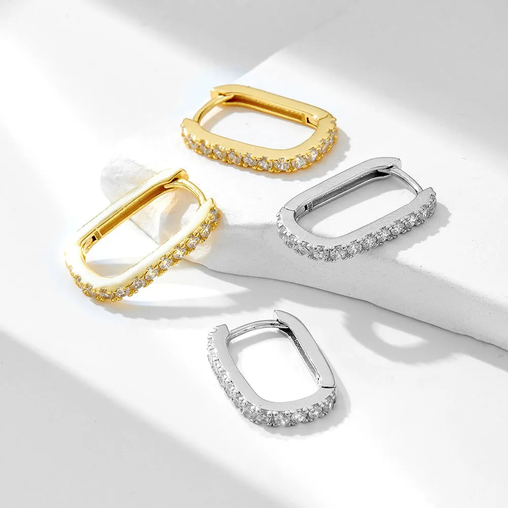 S925 sterling silver oval zircon earrings with geometric design and ear clip backings