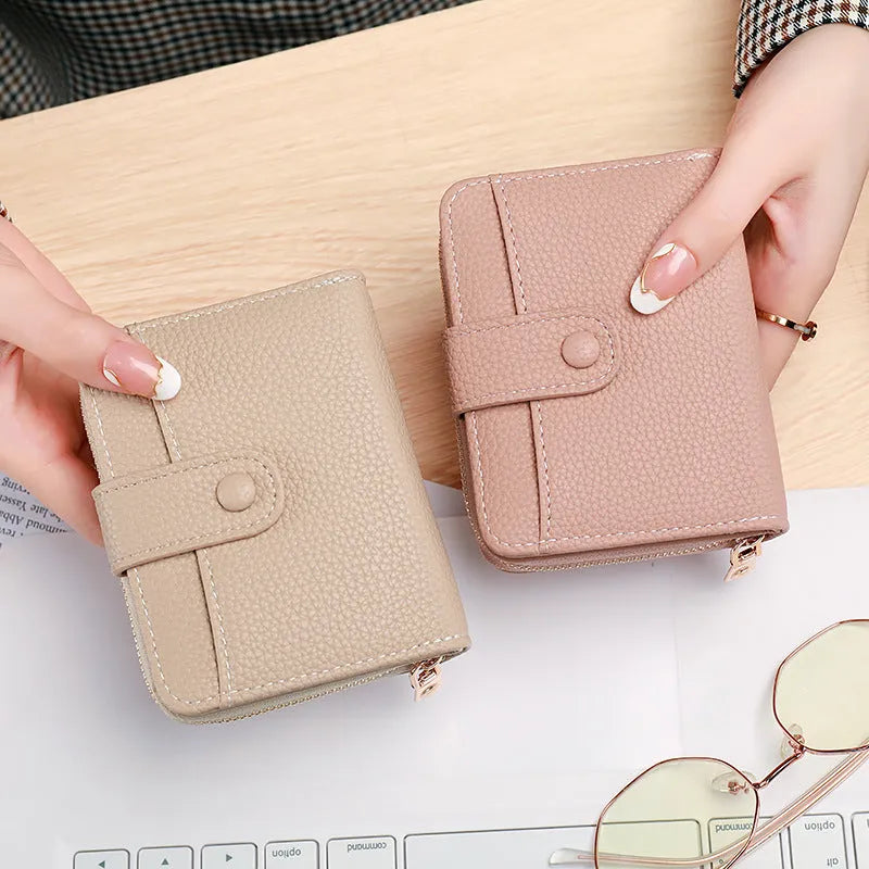 Ladies' short wallet with lychee pattern in PU leather showing 2-fold design in beige colour
