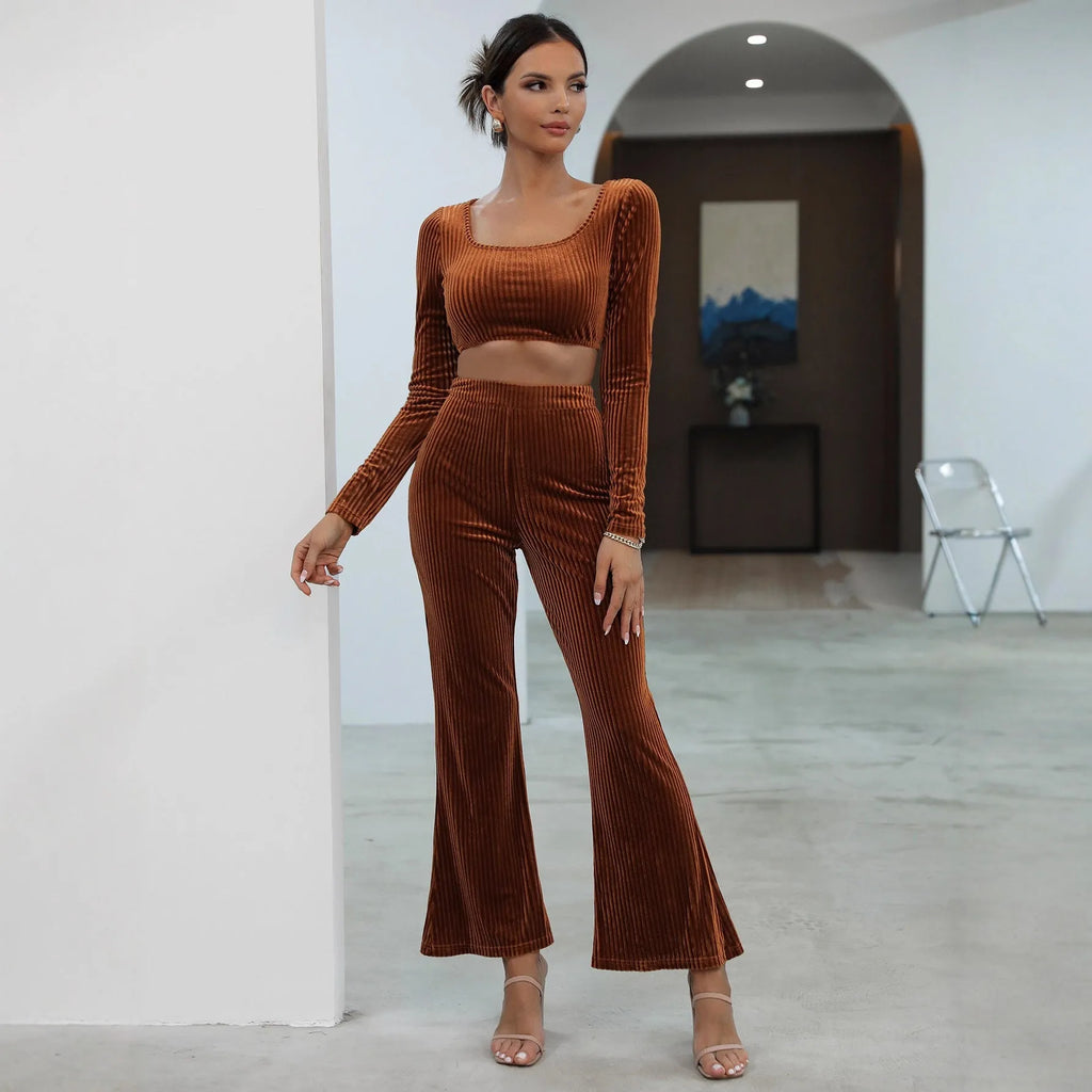 Caramel-colour long sleeve sweater and matching trousers casual set on a hanger.