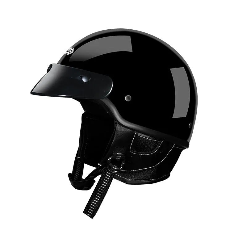 Retro style motorcycle helmet shown in cement grey colour on a solid background.