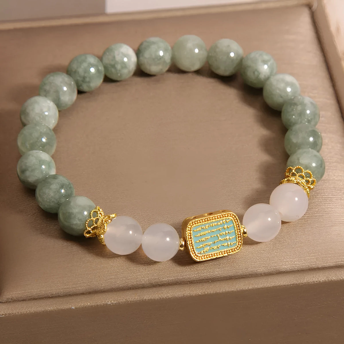Women's crystal bracelet with oil green emerald stones and a scripture charm