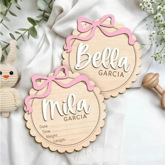Square wooden baby room ornament with customised name engraving, shown in two size options.