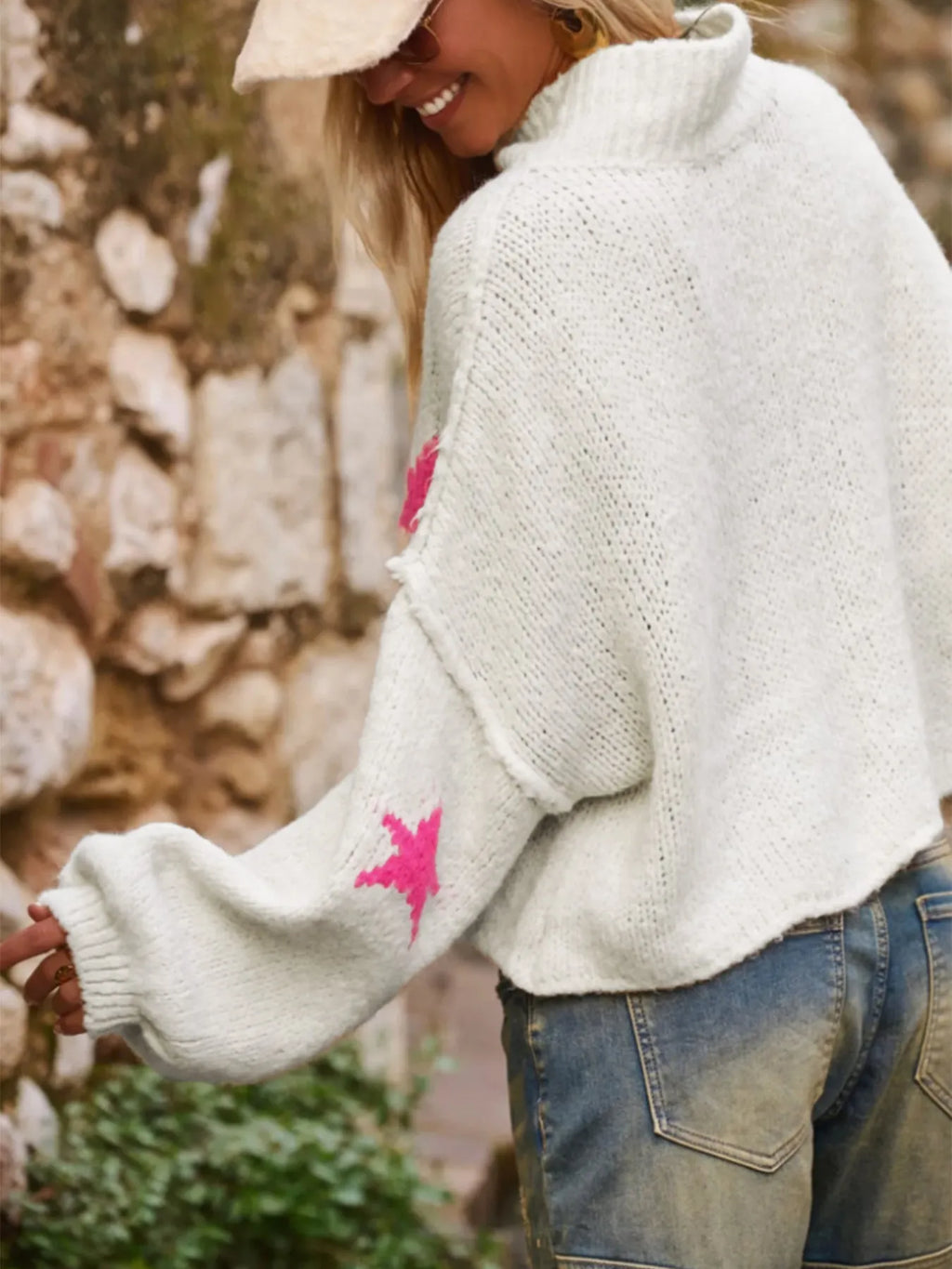White women's turtleneck pullover with contrast star pattern on imitation velvet fabric