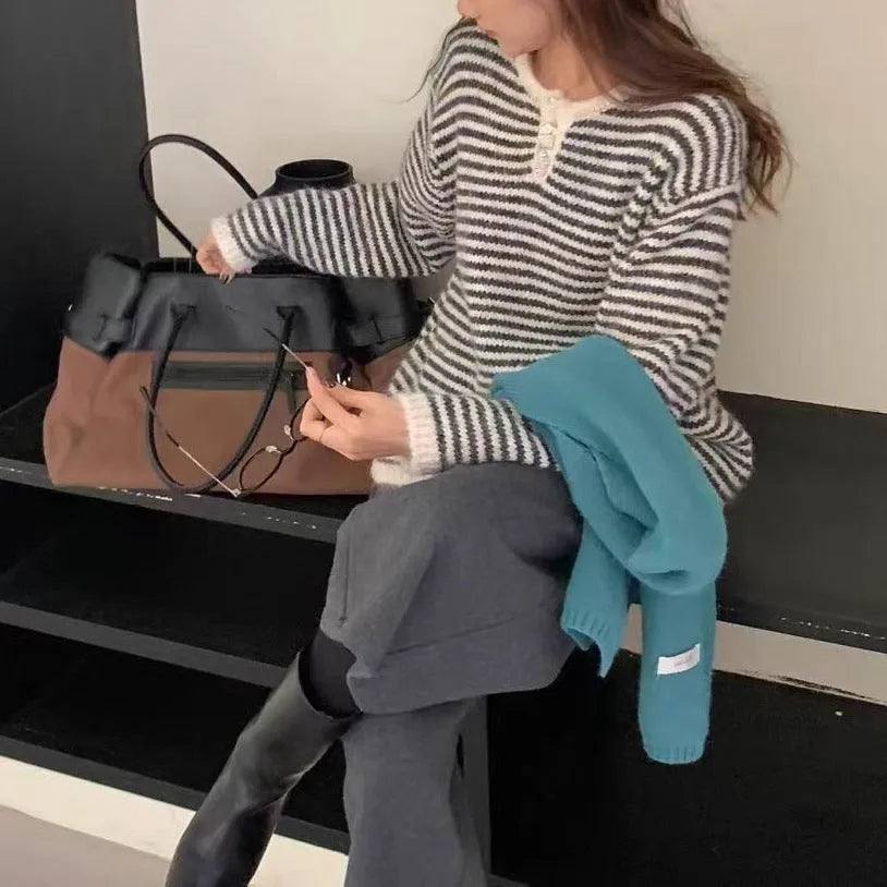 Women's striped cashmere pullover sweater in red and blue colour options with retro styling