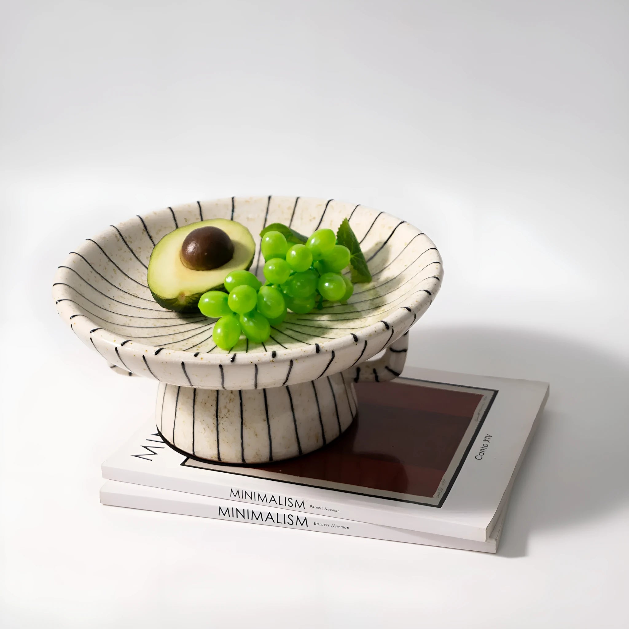 Black and white striped retro synthetic resin fruit plate ornament.