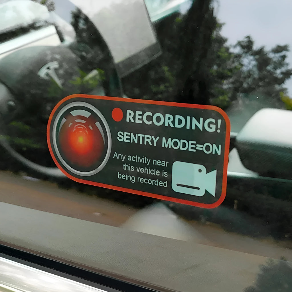 Pair of white electrostatic warning stickers for Tesla Sentry Mode, sized 11x5 cm.