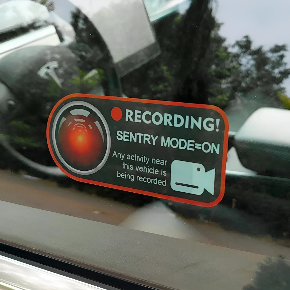 Pair of white electrostatic warning stickers for Tesla Sentry Mode, sized 11x5 cm.