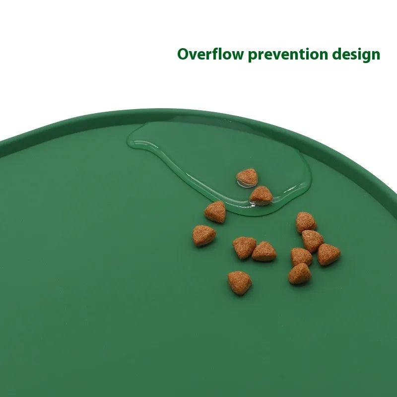 Silicone waterproof cat feeding placemat with non-slip base in beige colour on a wooden floor.