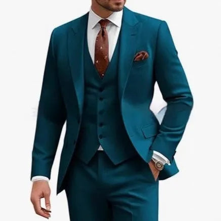 Man wearing a bright red slim fit three-piece suit with waistcoat, suitable for a wedding or business event.