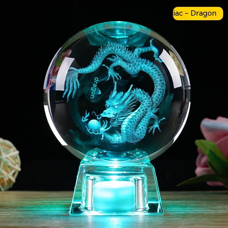 White crystal zodiac ornament with electronic luminous base showing Chinese animal design