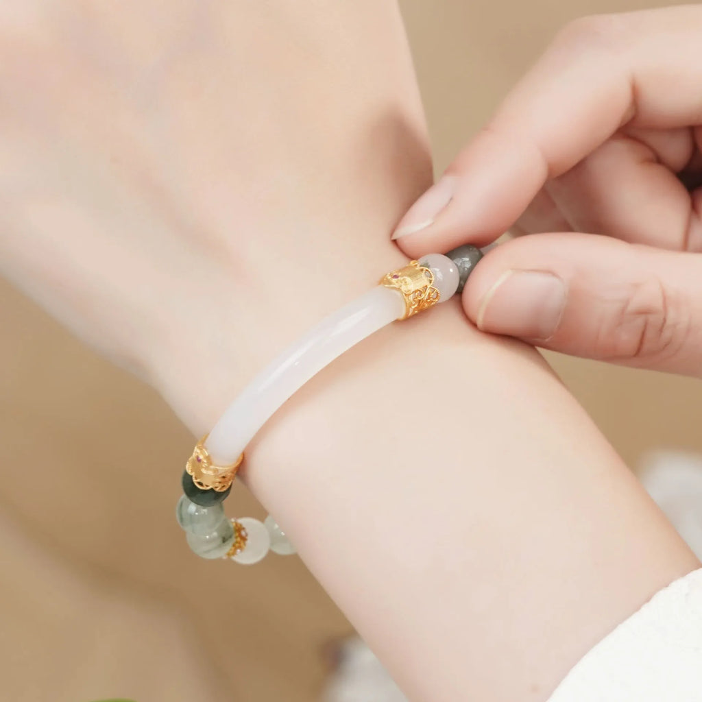 Emerald green Tian Shan Cui jade half bracelet with round beads and traditional national style design