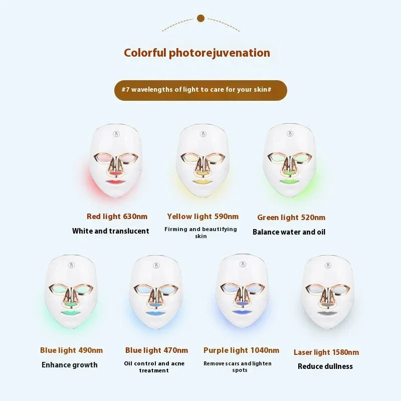 White rechargeable LED beauty mask with touch controls and adjustable head strap on a table.
