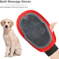 Red pet bathing glove with integrated cleaning brush showing adjustable design for left or right hand use